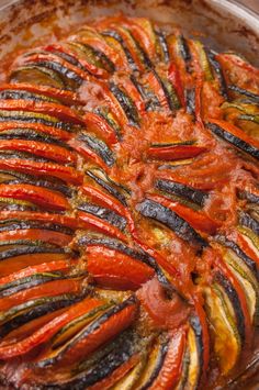 the dish is prepared and ready to be eaten with tomato sauce on it's side