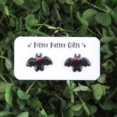 Mothman cryptid earrings created from lightweight durable plastic, posts are hypoallergenic titanium.  Mothman measures 15mm wide approx. // Info: * Titanium posts * 100% Nickel-free * Hypoallergenic for sensitive ears * Ultra lightweight! We always include a pair of spare rubber backings with each order. ♥ // You might like these: https://www.etsy.com/listing/1558928343/dainty-skeleton-cat-earrings-black-cat?click_key=202d608e12075a9efd664d0380f70626b58e4620%3A1558928343&click_sum=6ccd0dc5&ref= Black Novelty Earrings For Gifts, Novelty Black Earrings For Gift, Black Novelty Earrings For Gift, Hypoallergenic Jewelry For Halloween Gift, Hypoallergenic Jewelry Gift For Halloween, Nickel-free Black Plug Earrings As Gift, Mothman Earrings, Titanium Earrings Sensitive Ears, Mothman Cryptid