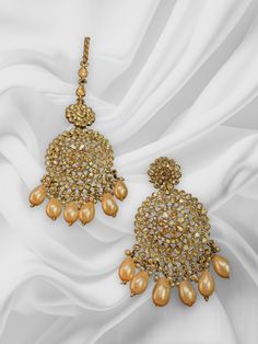 These chandbalis with matching maangtikka comes as a pair and is beautifully handmade with high quality polki stones. This set is perfect for any bridesmaid, bride, sangeet or any occasion or event as a gift for any occasion as any one who loves jewelry will love this statement piece. It has beautiful colors that really make the set a statement piece. Product Details: • Tikka • Earrings Free Shipping/Ready to Ship and available immediately if you place an order today! Fast and Free Shipping US C Chandbali Kundan Tikka With Mirror Work, Bollywood Kundan Chandbali Sets, Chandbali Kundan Necklace For Wedding, Festive Chandbali Bridal Sets For Eid, Gold Anarkali Jhumkas For Wedding, Hand-set Chandbali Earrings For Eid, Hand Set Kundan Chandbali Traditional Wear, Gold Jhumkas For Wedding, Kundan Chandbalis With Stone Work For Eid