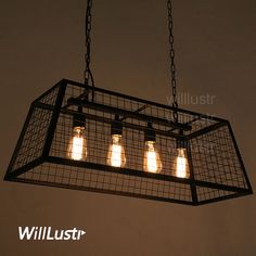 four light bulbs are hanging from a caged chandelier