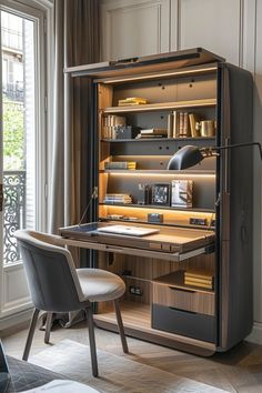 a desk and chair in front of a large bookcase with shelves on the wall