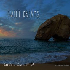 there is a rock in the ocean with words above it that says, sweet dreams