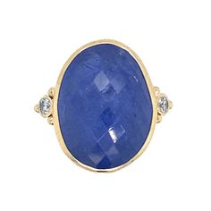 A regal Tanzanite is set in 14k yellow gold accented by two brilliant white diamonds. Finished with Emily's signature seagrass band in solid 14k yellow gold and handmade gold bead accents. Approximate stone size: 20mm x 12mm Approx CT weight: 13.85cts Approx diamond weight: .14cts Mohs hardness scale: 6-7 This one of a kind piece is handmade with love in Emily's Hudson Valley studio. If you have questions about sizing, shipping or need help deciding on your perfect piece please reach out to us! Exquisite Yellow Gold Rings With Gemstone Accents, Fine Jewelry Yellow Gold Tanzanite Rings, Yellow Gold Tanzanite Gemstone Rings, Tanzanite Gemstone Rings In Yellow Gold, Heirloom Tanzanite Yellow Gold Rings, Timeless Tanzanite Yellow Gold Jewelry, Heirloom Tanzanite Rings In Yellow Gold, 14k Gold Ring With Gemstone Accents, Elegant Tanzanite Jewelry With Rose Cut Diamonds