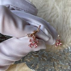 The cutest pink sakura cherry blossom flower star ear climber, ear crawler, ear stud earrings, delicate dainty beauty handmade of pink cz crystal and 14K Gold plated sterling silver, it shines gorgeously from every angle! Adorable girly feminine vibes, yet elegant and chic, goes perfect with everyday/occasions/bridal or bridesmaid look! Definitely a cute gifts idea. ♥ All of our jewelry are carefully handmade with delicate and exquisite details, all designed and made in Manhattan, New York. 💎 Features: ♥ Made to Order ♥ Material: 14K Gold plated sterling silver ♥ Main stone: pink crystal gemstone ♥ Side Stone: Cz crystal ♥ Push back Closure 💎 Details: ♥ Approximate Measurements: - Length: 0.45“ - Width: 0.6” ♥ Lightweight, easy to wear ♥ Nickel/Lead Free, Hypoallergenic 💎 Packing & Ship Pink Flower Earrings Gift For Her, Delicate Rose Gold Ear Climbers For Gift, Delicate Rose Gold Ear Climbers As Gift, Pink Drop Flower Earrings As Gift For Her, Pink Drop Flower Earrings For Her, Pink Flower Earrings For Her, Pink Flower Earrings As Gift For Her, Rose Gold Ear Climbers As Gift, Rose Gold Ear Climbers With Ear Wire As Gift