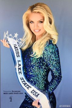 the miss usa contestant poses for a photo in her blue and silver outfit with a tiara