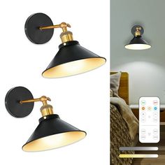 two black and gold wall lights with remote control