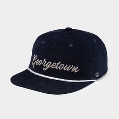 We referenced our favorite vintage hat designs and styles to create this simple – yet statement – corduroy Georgetown hat. Featuring the comfort of a dad hat and the structure of a snapback, this durable, retro-inspired cap is built for the Hoyas. Each corduroy hat is adjustable, and size ranges from cap sizes 7 to 7 3 Corduroy Hat, Vintage Hat, Dad Hat, Hats Vintage, Hat Designs, Retro Inspired, Dad Hats, Soft Fabrics, Vintage Inspired