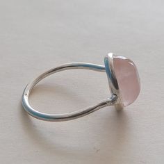 Handmade Rose quartz bohemian ring , you can wear this ring as a party wear ring .. Title - Rose Quartz stone ring Stone color - Pink Stone shape - oval Material - Sterling silver 925 Note - We use natural gemstones, so color shade may be little bit different .. we are giving you best quality rings on best price .. contact us for more quantity Pink Sterling Silver Spiritual Rings, Silver Rose Quartz Crystal Ring, Handmade Adjustable Rose Quartz Rings, Pink Stone Ring, Quality Rings, Pink Stone Rings, Green Stone Rings, Bohemian Ring, Handmade Rose