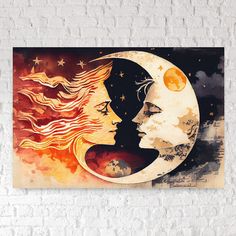 a painting on the wall of a woman's face next to a crescent moon