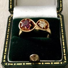 EXCEPTIONAL FRENCH VINTAGE ART DECO 18K YELLOW GOLD RING, SET WITH AN EXCEPTIONAL RUBY AND MAGNIFICENT NATURAL DIAMOND.REMARKABLE WORK, UNIQUE DESIGN, BAUTE COUTURE, LUXURY JEWELRY, DESIGNER WORK.THE STONES ARE REAL, AUTHENTIC.SPLENDID RUBIS, EXCEPTIONAL QUALITY, VERY BELLE COULEUR: 5 mm.MAGNIFICENT, VERY BRILLIANT, SUPERBE DIAMANT QUALITY: 3.7 mm.RING WIDTH: 8 MM.WEIGHT: 6.5g.HALLMARK: 18KFRENCH SIZE:50.US SIZE: 5 1/4.IN VERY GOOD CONDITION.CASE NOT INCLUDED. Vintage Art Deco Rings, Carved Ring, 18k Gold Ring, Deco Ring, Message Jewelry, 18k Yellow Gold Ring, Gold Price, Ruby Diamond, Vintage Jewels