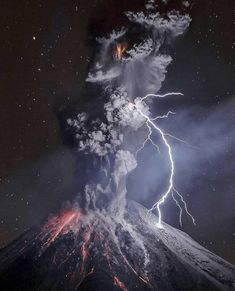 a very tall volcano with lightning coming out of it