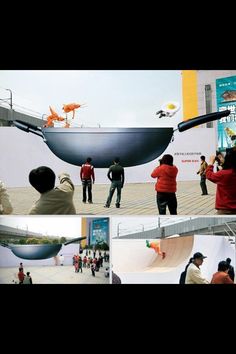 people are taking pictures of a boat on display in front of a building with an orange bird flying over it