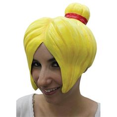 a woman wearing a yellow wig with two red hair clips on top of her head