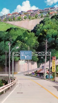 an empty street with trees and signs on it