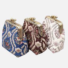 Discover the perfect blend of elegance and functionality with this chic coin purse. Lovingly crafted from rich Chenille Carpet and adorned with a delightful cotton floral canvas, this vintage-style wallet exudes timeless charm. The brass clasp, featuring a double kiss lock, adds a touch of sophistication to this accessory. Effortlessly secure your belongings while showcasing your impeccable taste. Designed with convenience in mind, this coin purse boasts pockets on both sides of the middle panel. Organize your ID, cards, money, and coins with ease, making it an ideal companion for your daily adventures. Handmade with care, this charming coin purse not only elevates your style but also makes for a thoughtful gift for your loved ones. Surprise them with a touch of vintage luxury they'll cher Luxury Pouch Coin Purse For Daily Use, Elegant Rectangular Pouch With Card Slots, Evening Pouch Shoulder Bag With Card Slots, Elegant Handheld Bag With Card Slots, Elegant Compact Coin Purse With Coin Pocket, Elegant Formal Pouch With Card Slots, Elegant Handheld Wallets With Card Slots, Elegant Handheld Wallet With Card Slots, Elegant Handheld Wallet With Phone Bag