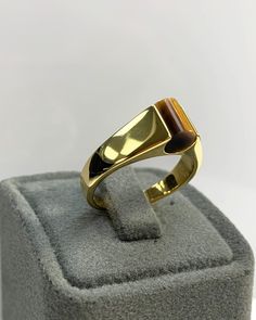 Tiger Eyes Men Ring, Blue Pinky Ring, Cylinder Genuine Gemstone, Stylish Gold Silver Ring, Handmade Jewelry, Best Gift for Him ◎ Details ◎ ○ Material 14K Solid Gold or 925 Sterling Silver Weight of Ring : approx 7.00 gr Height of Ring : approx 6.15 mm Width of Band : approx 6.80 mm ○ Upgrade to Solid 18K Gold, please click the link below: https://www.etsy.com/listing/962826004 ○ Gemstone Natural Tiger Eyes approx. 6.80 mm x 6 mm approx. 1 ct Made to Order HANDMADE ITEM ○ For Men Collection : htt Classic Brown Rings With Polished Finish, Formal Brown Rings With Polished Finish, Modern Gold Opal Ring With Polished Finish, Elegant Brown Signet Ring For Anniversary, Brown Polished Signet Ring For Anniversary, Brown Polished Finish Signet Ring For Anniversary, Modern Brown Rings For Anniversary, Modern Brown Anniversary Ring, Tiger Eyes