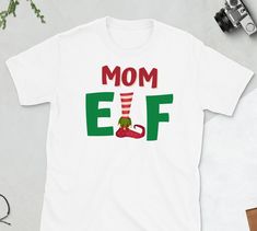 Funny Elf Shirt, Elf Costume Tee, Most Likely To, Family Elves, Matching Family PJs, Matching Elf Pajamas, Cute Elf Pajamas, Christmas Shirt *Thank you for visiting our shop! *If you'd like to see this design on another product, don't hesitate to reach out. **For other great products, visit our shop @ https://www.etsy.com/shop/InspiremeteesCo * 100% ring-spun cotton * Sport Grey is 90% ring-spun cotton, 10% polyester * Dark Heather is 65% polyester, 35% cotton * 4.5 oz/yd² (153 g/m²) * Pre-shrun Matching Family Pjs, Elf Pajamas, Christmas Elf Costume, Elf Family, Elf Funny, Elves Gift, Pajamas Christmas, Family Pjs, Xmas Elf