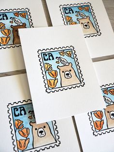 four stamps with pictures of animals on them and the letters e, f, c