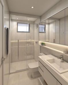 a white bathroom with two sinks, mirrors and a walk - in shower next to a toilet