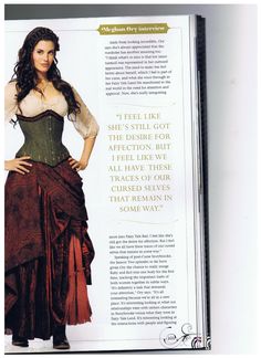 a magazine with an image of a woman in a corset and skirt on it