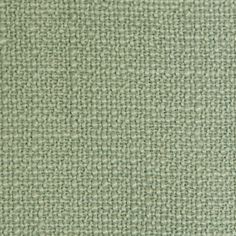 an upholstered light green fabric texture