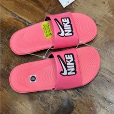 Let Your Kids Squish Around In Comfort With The Nike Kawa Slide Fun. The Bright, Funky, And Unbelievably Fun Slides Are Perfect For All-Day Wear. So Unbelievably Comfortable And Squishy, These Slip-Ons Are Bound To Be Instant Favorites With Your Kids. Easy To Slip Into, Impossible To Give Up, These Slides Simply Go With Everything. Nike Kawa Slide Fun Features: Synthetic Leather Strap Provides Durability And Easy Cleaning. Soft Foam Midsole Ensures Ample Cushioning. Outsole With Grooves Provide Playful Non-slip Synthetic Slides, Pink Cushioned Slides With Round Toe, Pink Slides With Cushioned Footbed And Round Toe, Non-slip Synthetic Fun Slides, Fun Non-slip Synthetic Slides, Pink Slip-resistant Sneakers For Summer, Pink Slip-on Slides For Swimming, Pink Non-slip Slip-on Slides, Pink Cushioned Slides For Swimming