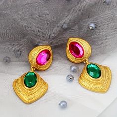 Elegant Retro Style Bold Statement Earrings Made Of 18k Gold Plated Alloy And Synthetic Gems. #18k #Goldplated #Retrostyle #Dangleearrings #Amber #Ruby #Gemstones Gold Teardrop Earrings With Jewels, Gold Jeweled Dangle Earrings, Gold Jeweled Drop Earrings, David Yurman Earrings, Multicolor Earrings, Green Gems, Amethyst Earrings, Green Gemstones, Pearl Stud Earrings