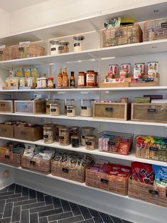 an organized pantry with baskets and food items