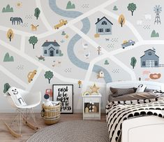 a child's bedroom with a map wallpaper