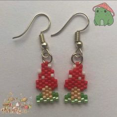 Hand beaded brick stitch mushroom earrings. Perfect for a fairy look or to get into the fall / autumnal mood. Can be made with gold or silver toned wire and with hooks, hoops or clip ons. Beaded Brick Stitch, Beaded Mushroom, Fairy Look, Chore Charts, Mushroom Earrings, Red Mushroom, Brick Stitch, Star Earrings, Hand Beading