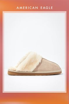 Genuine suede upper/Plush cuff/Slip-on style/Cushioned footbed/Flexible EVA outsole/Not eligible for promotions Comfy Slip-on Fall Slippers, Comfortable Slip-on Slippers With Plush Lining, Casual Faux Fur Slip-on Slippers, Cushioned Slip-on Faux Fur Slippers, Comfortable Slip-on Faux Fur Slippers, Women's Jeans, American Eagle Outfitters, American Eagle, Women Jeans