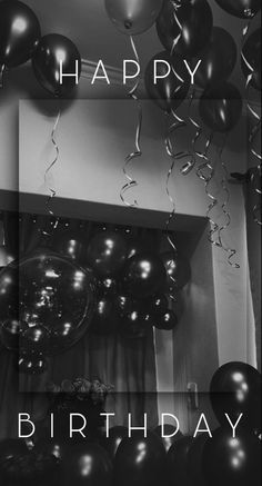 black and white photograph of balloons with the words happy birthday