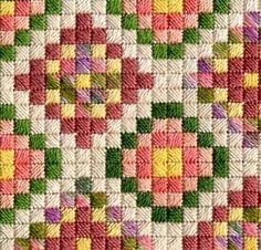 a close up view of the colorful squares on this afghan pattern, which has been made with