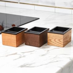 Specht bench top knock boxes pair beautifully with wood-accented espresso machines and home décor. Their durable metal inner is removable, for ease of cleaning. Each walnut, oak, and cherry knock box is finished by hand with organic waxes and oils.