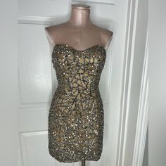 Up For Sale Scala Sequins Strapless Cocktail Mini Dress Sz 2 Measurements:*Item Was Measured Laying Flat* Bust- 15 1/2”Across Waist- 13” Across Length-26” Dress Has No Stretch!!! Gold Strapless Sequin Mini Dress, Gold Sequined Strapless Mini Dress, Gold Strapless Mini Dress With Sequins, Gold Sequined Strapless Dress, Gold Embellished Strapless Dress, Strapless Embellished Cocktail Dress, Gold Strapless Fitted Sequin Dress, Gold Strapless Sequin Dress, Gold Strapless Dress With Fitted Bodice