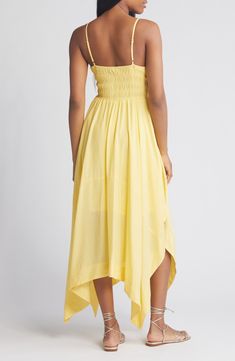 This midi-length sundress features a curve-hugging shirred bodice and a flowy handkerchief hem that sways as you walk. 36" center front length (size Medium) Slips on over head V-neck Adjustable straps Partially lined 82% viscose, 18% nylon Hand wash, dry flat Imported Spring Knee-length Maxi Dress With Ruched Bodice, Sundress Maxi Dress With Ruched Bodice For Brunch, Casual Maxi Dress With Ruched Bodice And Spaghetti Straps, Flowy Maxi Sundress For Daywear, Daywear Spaghetti Strap Dress With Smocked Back, Flowy Maxi Dress With Spaghetti Straps For Daywear, Daywear Dresses With Smocked Bodice And Spaghetti Straps, Midi Sundress With Ruched Bodice For Day Out, Midi Sundress With Ruched Bodice For Brunch