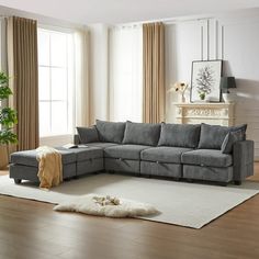 a living room filled with furniture and a rug