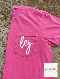 *New New New* 🖤3D Puff Embroidered Pocket Monogram T-Shirt 🖤  Customize this soft and comfy T-shirt! Choose your monogram font style, T-shirt color and thread color! Pocket T-Shirt Features: -Brand: Comfort Colors - 100% Soft Ring-Spun Cotton -Unisex Relaxed Fit Pocket T-Shirt -Sizes: S - 3XL -Available in a variety of colors - (Colors/shades may vary from shirt to shirt due to the pigment dye process.) -Made with OEKO-TEX certified low-impact dyes. -3D Puff Embroidery - Embroidery foam is added to enhance the design to give it that 3D Puff look. -Embroidery foam is water-resistant, non-toxic, and can be machine washed. *Note: Pocket is sewn shut due to embroidery. *Pocket T-Shirts shown in photos:  1. Crunchberry  2. Monogram lowercase initials - lej 3. Cream thread color 1. Butter 2. M Casual Cotton Monogram T-shirt, Pink Monogram Crew Neck Top, Pink Monogrammed Crew Neck Top, Pink Crew Neck Top With Monogram, Pink Monogram Cotton Top, Pink Monogrammed Cotton Top, Pink Cotton T-shirt With Letter Embroidery, Cute Short Sleeve T-shirt With Letter Embroidery, Casual Cotton Monogram Tops