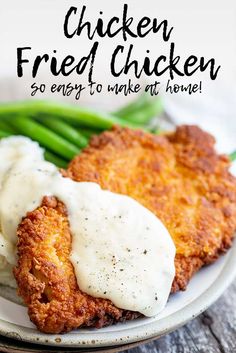 fried chicken is served with gravy and green beans