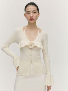 Composition : Viscose 70% Pbt 30%Color : CREAM,BLACKCountry of Origin : KOREA Chic Cream Knit Top, Spring Cream Knit Top, Spring Cream Knitted Top, Feminine Cream Knit Top, Chic Long Sleeve Cream Knit Top, Knit Set, Knitwear Cardigan, Knit Top, Knitwear