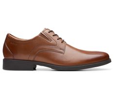 Step into sophistication with the Whiddon Plain dress shoe, featuring a seamless blend of rich materials and exceptional comfort designed for the modern man's lifestyle. From workdays to weekends, these shoes are your reliable companion, offering a heritage look with their crafted leather uppers while ensuring every step is a pleasure. From Clarks. Business Wingtip Dress Shoes With Ortholite Insole, Modern Synthetic Dress Shoes For Business, Wingtip Dress Shoes With Ortholite Insole For Business, Classic Synthetic Oxfords For Formal Occasions, Classic Synthetic Oxfords For Formal Wear, Business Dress Shoes With Ortholite Insole And Wingtip, Classic Synthetic Dress Shoes For Formal Occasions, Classic Formal Synthetic Oxfords, Modern Synthetic Dress Shoes For Formal Occasions