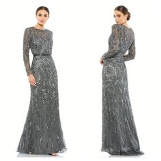 Mac Duggal Size 8 Beaded Long Sleeve Evening Gown Charcoal Gray New With Tags Description Long Sleeve Evening Gown With A High Bead-Accented Neckline, Fitted Bodice, Illusion Yoke And Sleeves, And A Floor-Length Mermaid Skirt With A Sweeping Hem. The Mesh Overlay Is Adorned With Beads And Sequins Placed In An Abstract Pattern. A Hand-Beaded Belt Accents The Natural Waist. Mac Duggal Beaded Fabric (100% Polyester) Sheer Sleeves And Yoke; Partially Lined Bodice; Fully Lined Through Skirt Back Zipp Evening Gown With Sweep Train In Gray, Fitted Embellished Gray Evening Dress, Fitted Embellished Gray Gown, Embellished Fitted Gray Gown, Fitted Gray Embellished Evening Dress, Gray Sequined Floor-length Evening Dress, Long Sleeve Gray Gown For Party, Gray Embellished Fitted Gown, Silver Embellished Long Sleeve Gown