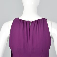 "This pretty Moschino dress is all silk in a lovely shade of purple. This listing is for one dress. The textile is 100% silk in purple, and this dress is lightweight and fully lined. The high neckline is gathered, and the waist gathers at the side and is finished with a lovely rosette detail. Size Marked: 6 Approximate Size: Small **Please Check Measurements to be Sure! Fabric: 100% Silk Closure: Side Zip Label: Moschino Condition: Excellent Era: 1990s Inventory#: DSC1117-1010 Measurements - Bus Simple Vintage Dress, Purple Silk Dress, Moschino Dress, Dress Simple, Purple Silk, Shades Of Purple, Vintage Dress, 90s Vintage, High Neckline