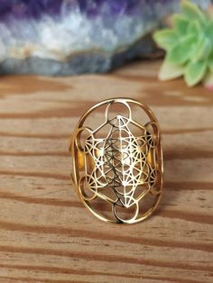 Metatron's cube ring in resizable gold stainless steel This ring is made of high quality stainless steel. The gilding is not afraid of water and will resist over time. It fits from size 50 to 62 (French size) or from size 5.5 to 10 (US size) Metatron's Cube, Metatrons Cube, Not Afraid, Rings Statement, Statement Rings, Accessory Gift, Jewelry Rings, Craft Supplies, Electronic Accessories