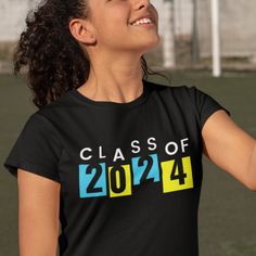 Introducing the Gildan 5000 T-shirt: "Class of 2024" Edition – the perfect way to commemorate your journey and celebrate your academic milestone in style! 🎓 Timeless Keepsake: Mark your place in history with this "Class of 2024" T-shirt, a timeless keepsake that will remind you of your academic achievements and the memories made along the way. 👕 Superior Comfort: Crafted from Gildan's trusted 100% cotton fabric, this T-shirt offers unparalleled comfort and breathability. Whether you're wearing it to class, events, or casual outings, it's perfect for all-day wear. 🌟 Classic Design: The "Class of 2024" design is elegantly simple, allowing you to showcase your graduation year with pride and style. It's a classic look that never goes out of fashion. 🎁 Perfect Gift: Looking for a thoughtful Black Crew Neck T-shirt For Back To School, Black T-shirt For College, Back To School, Black Letter Print T-shirt For Graduation, Black T-shirt With Letter Print For Graduation, Black T-shirt With Graphic Print For Graduation, Black Graphic Print T-shirt For Graduation, Black School Spirit Tops For Graduation, Black School Spirit Top For Graduation, Black Tops For Graduation With School Spirit