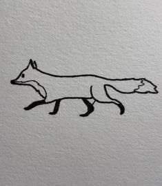 a black and white drawing of a fox