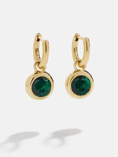 Elevate your ear stack with a chic and personal touch. The 18K Gold Birthstone Drop Earrings feature your unique birthstone in a chic and elegant design. Crafted with 18k gold plated sterling silver these birthstone earrings will last you for years of styling. Gold Emerald Earrings For May Birthstone, Yellow Gold Plated Birthstone Earrings, Tarnish-resistant Yellow Gold Earrings With May Birthstone, Green Birthstone Earrings, Green 14k Gold Birthstone Earrings, Ear Stack, Birthstone Earring, Gold Plated Sterling Silver, Elegant Design