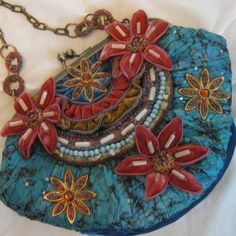 Mary Frances Textured, Embellished & Jeweled Cloth & "Velvet" Multi-Color (Blue/Teal/Mauve/Gold) Purse W/ Attached Flowers, Inset Beads And Gold Chain Strap; Measures 10" Wide (At Fullest Point) And Is 8" Top To Bottom. It Is New W/ Original Bag, But No Tags, Os Blue Bohemian Bag For Evening, Blue Bohemian Evening Bag, Bohemian Blue Bags As Fashion Accessory, Blue Embellished Bag For Everyday Use, Mary Frances Bags, Embellished Purses, Gold Purse, Mary Frances, Original Bags