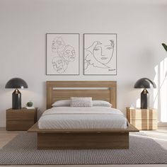 there is a bed in the room with two paintings on the wall