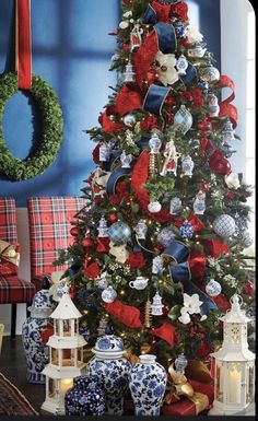 a christmas tree decorated with red, white and blue ornaments